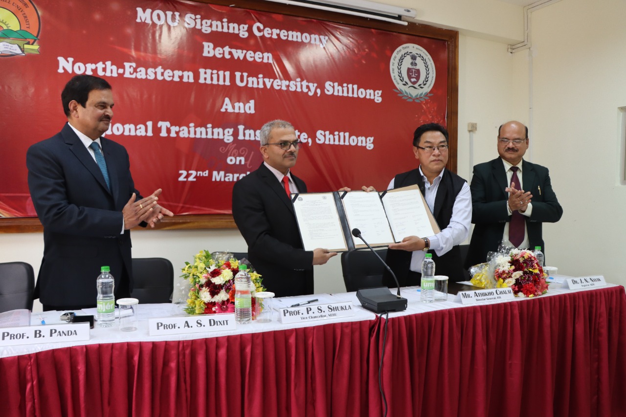 VC, NEHU and DG, RTI showing MoU Document to delegates